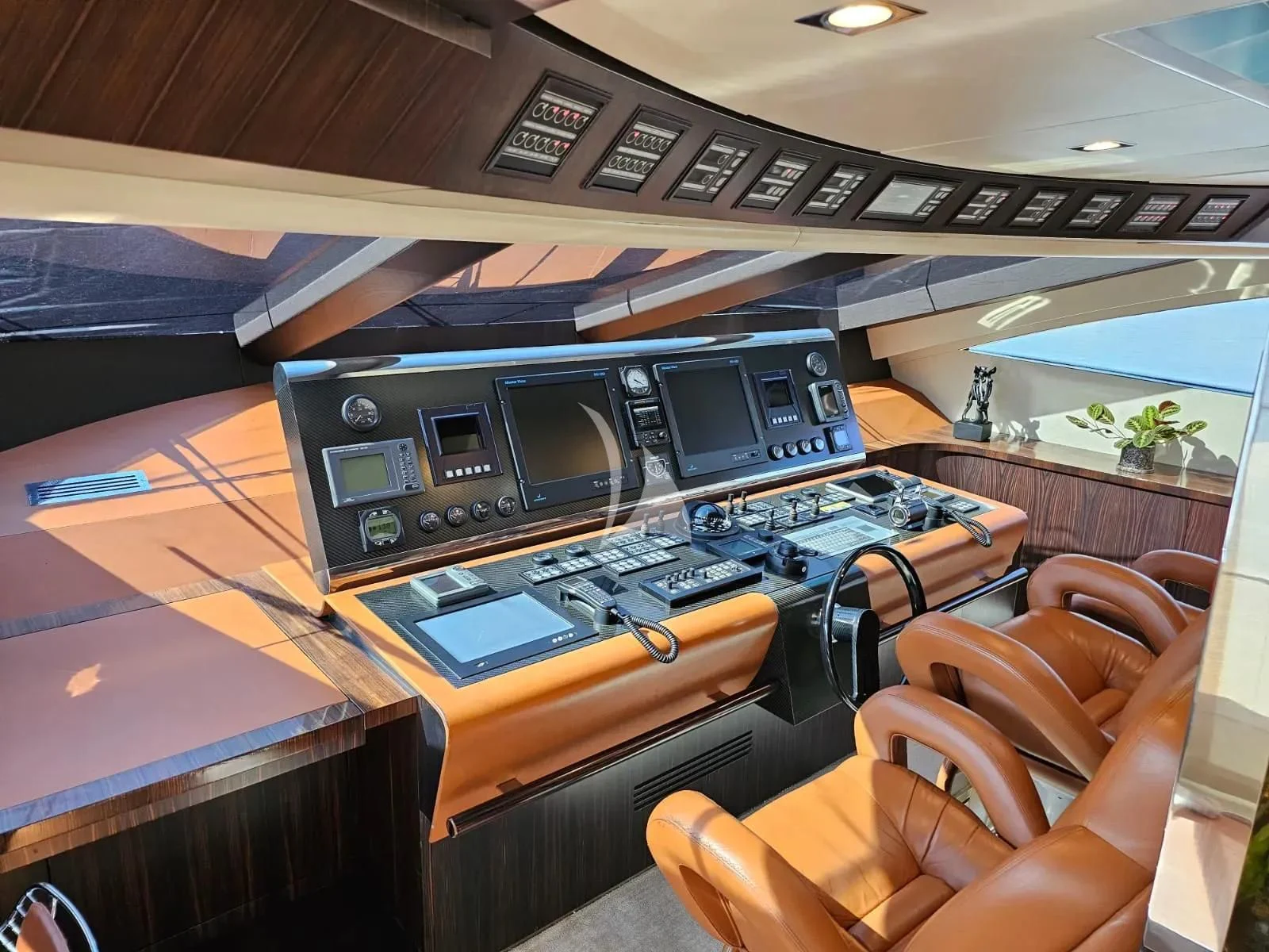 a plane cockpit with a seat aboard MAC Yacht for Sale