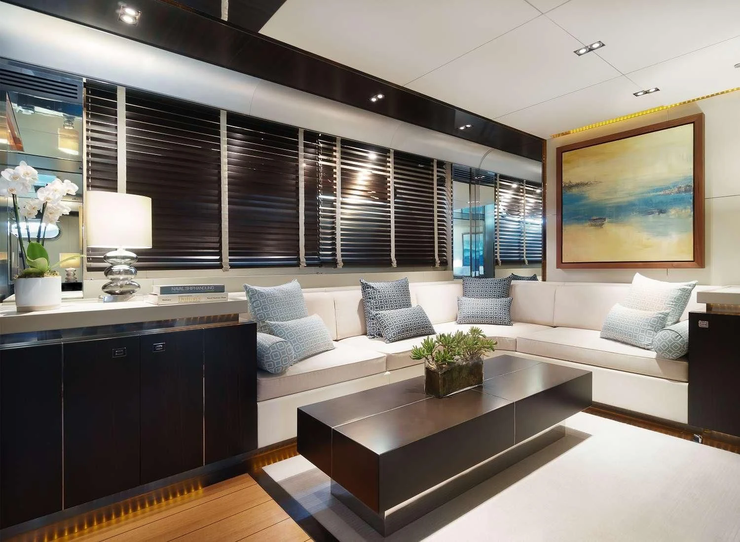 a living room with a large window aboard MAC Yacht for Sale