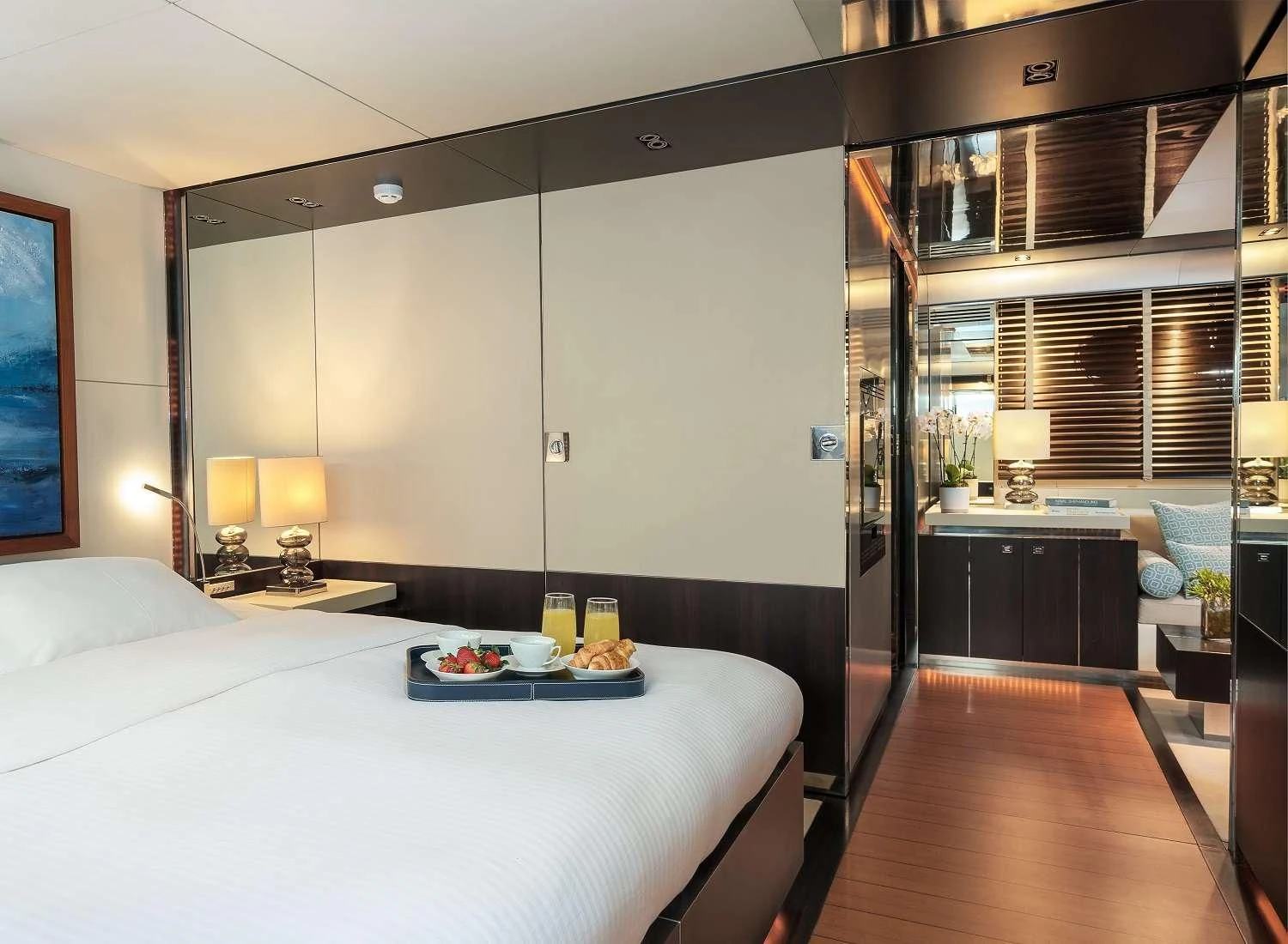 a bedroom with a large bed aboard MAC Yacht for Sale