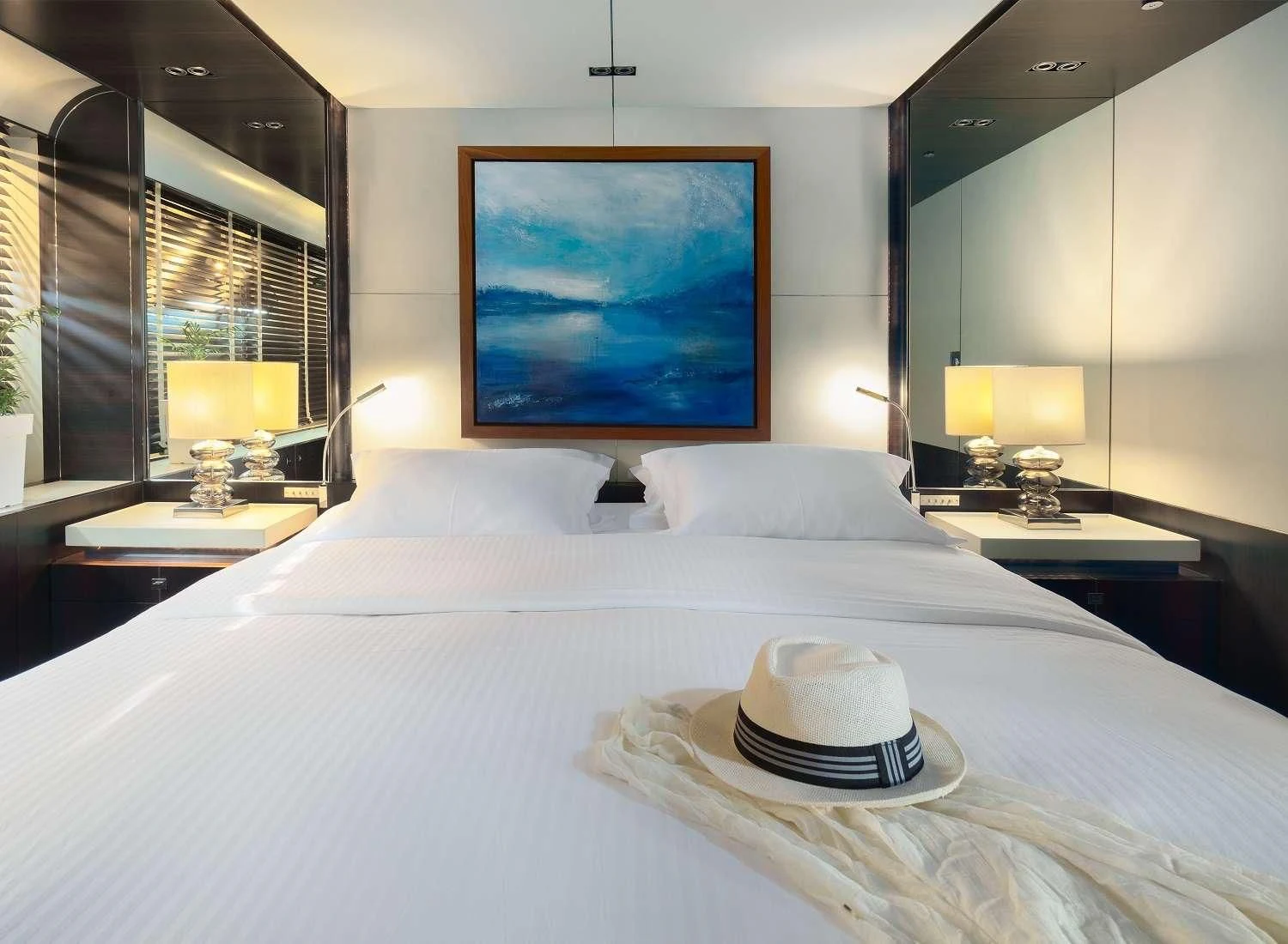 a hotel room with two beds aboard MAC Yacht for Sale