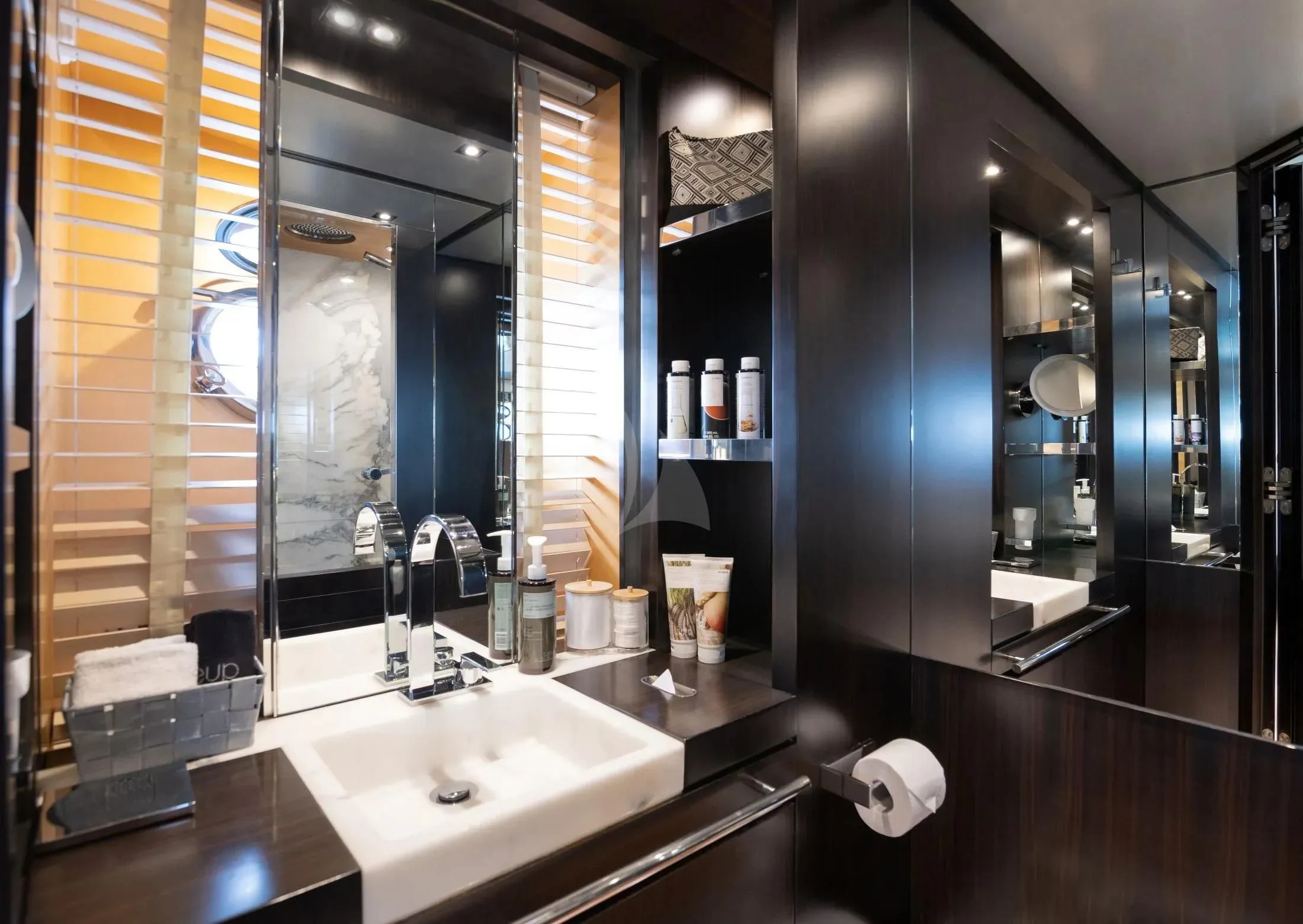 a bathroom with a large mirror aboard MAC Yacht for Sale