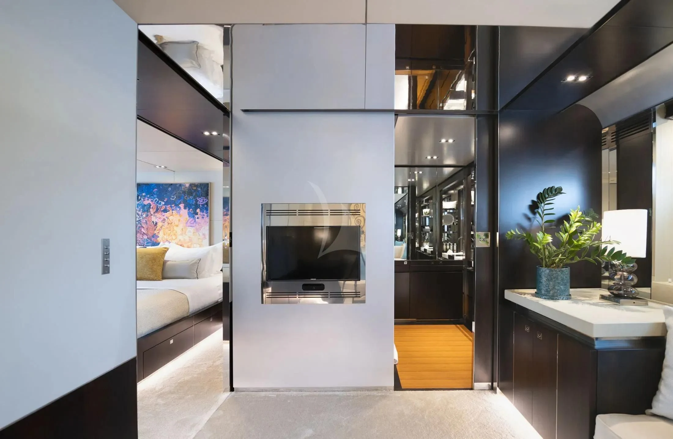 a room with a fireplace and a table aboard MAC Yacht for Sale