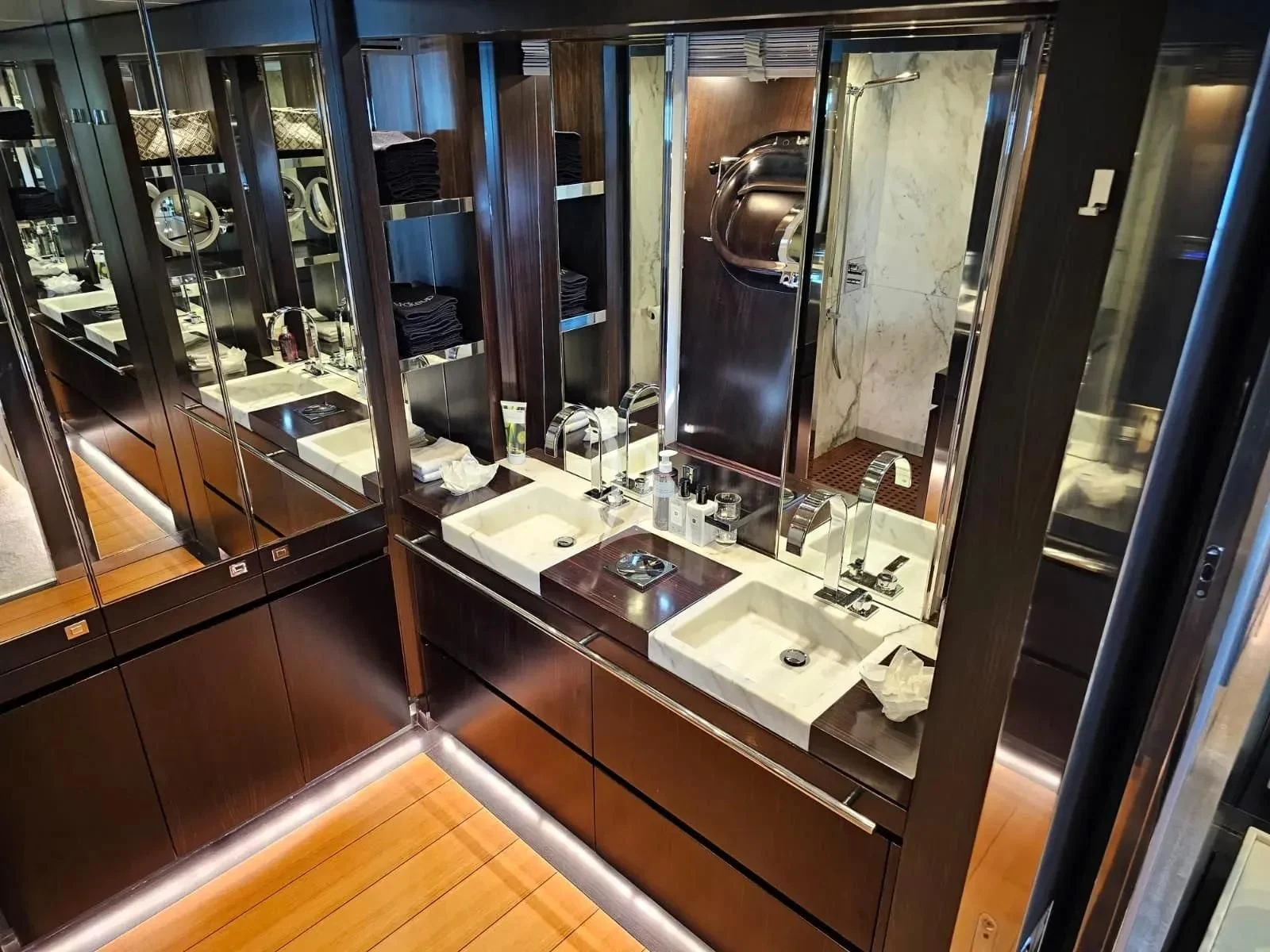 a bathroom with sinks and mirrors aboard MAC Yacht for Sale