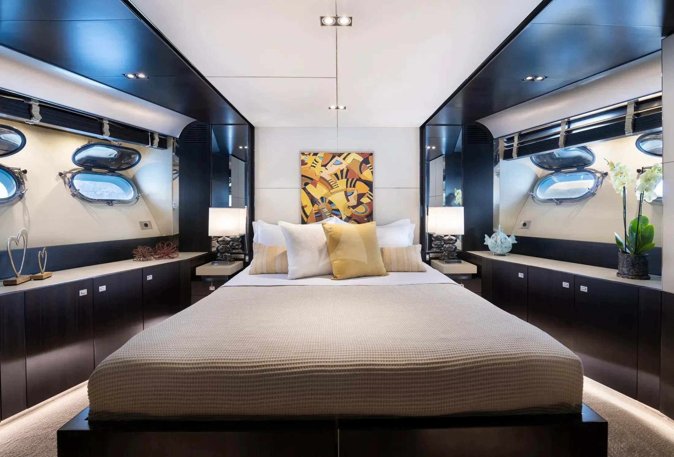 a bed in a room aboard MAC Yacht for Sale