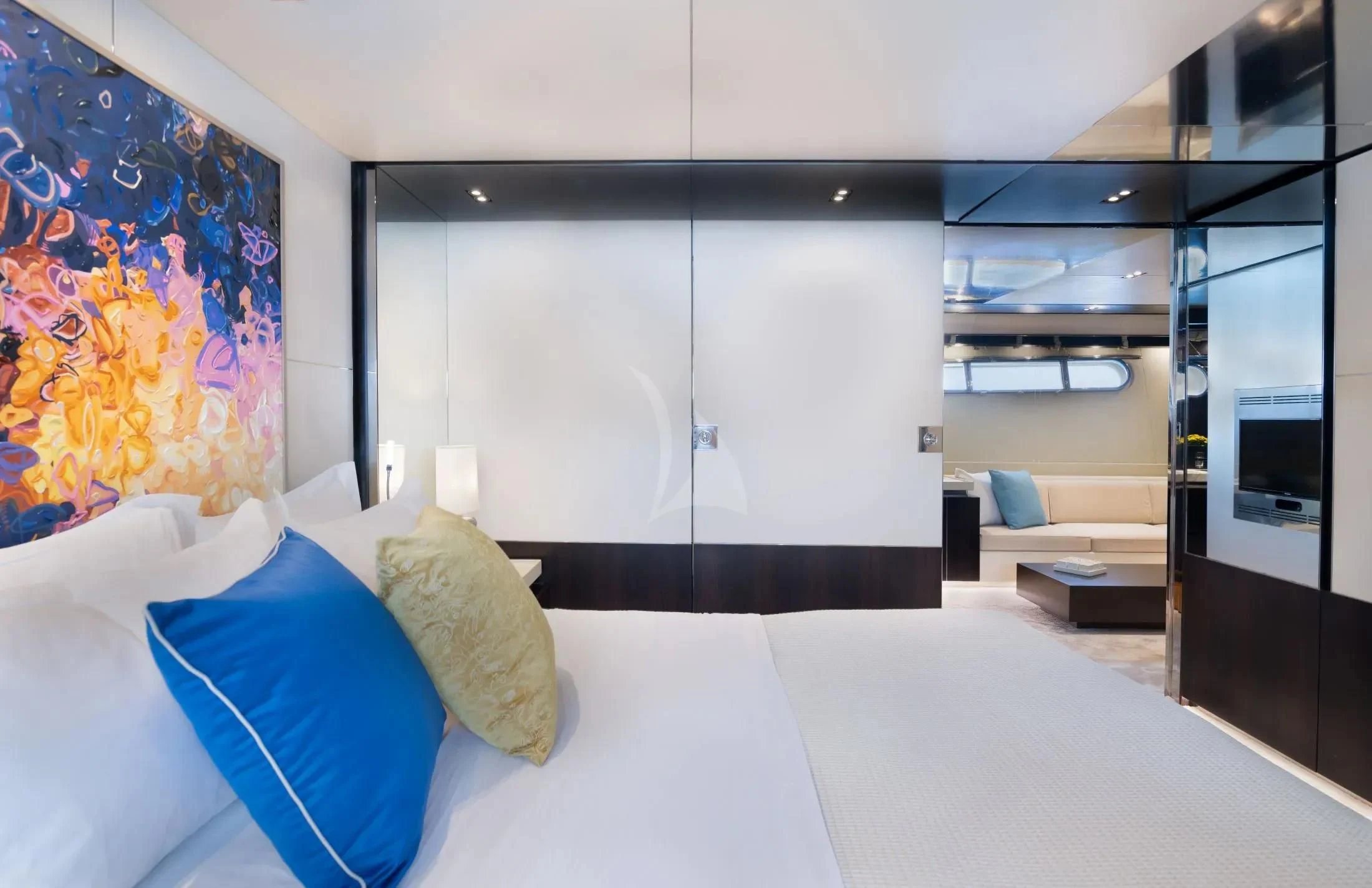 a room with a bed and a couch aboard MAC Yacht for Sale