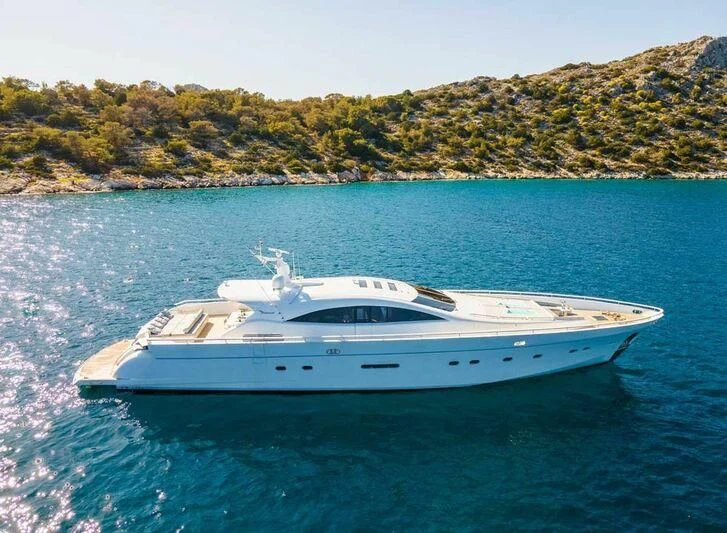 a white yacht in the water aboard MAC Yacht for Sale