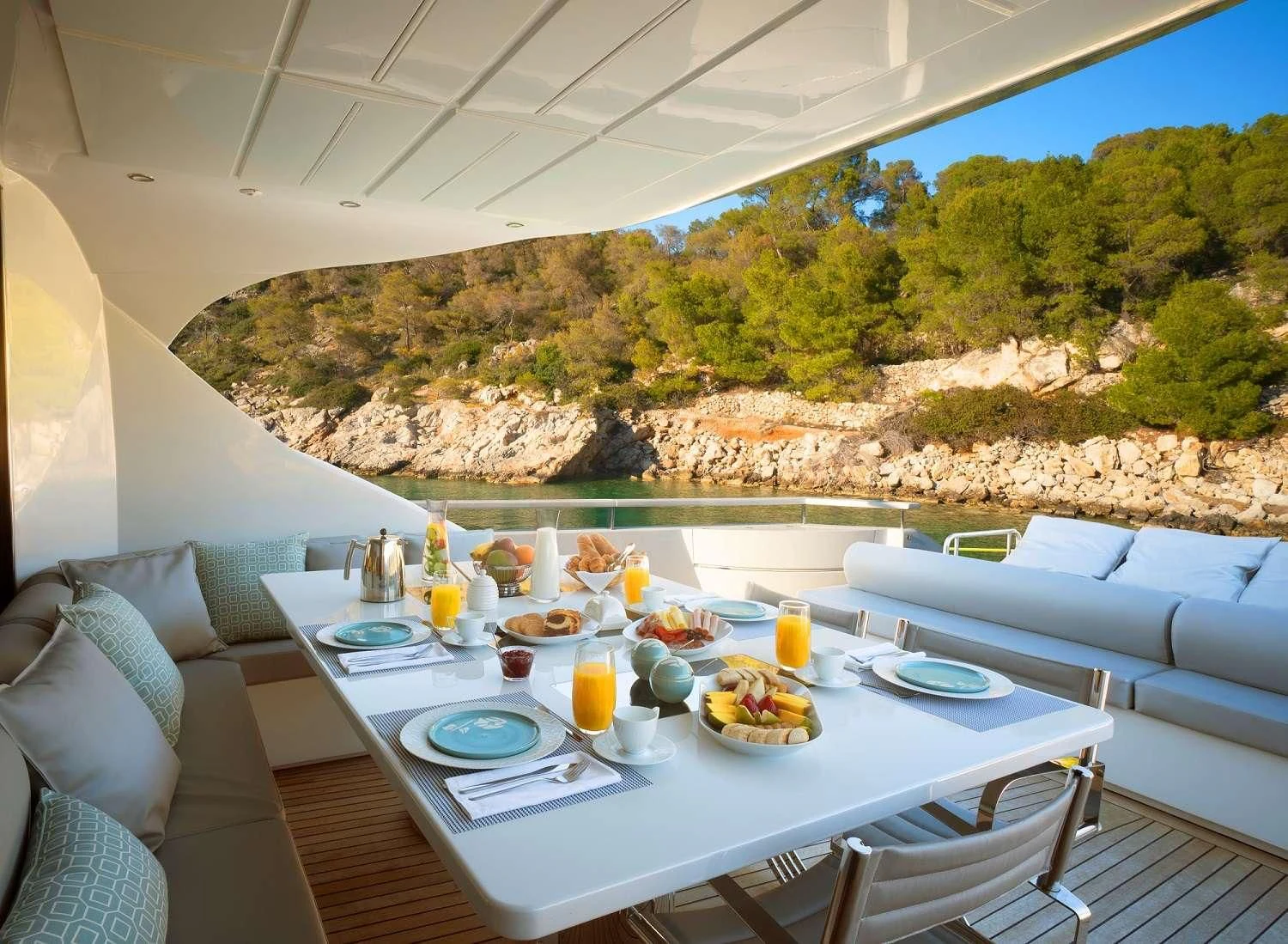 a table with food on it aboard MAC Yacht for Sale