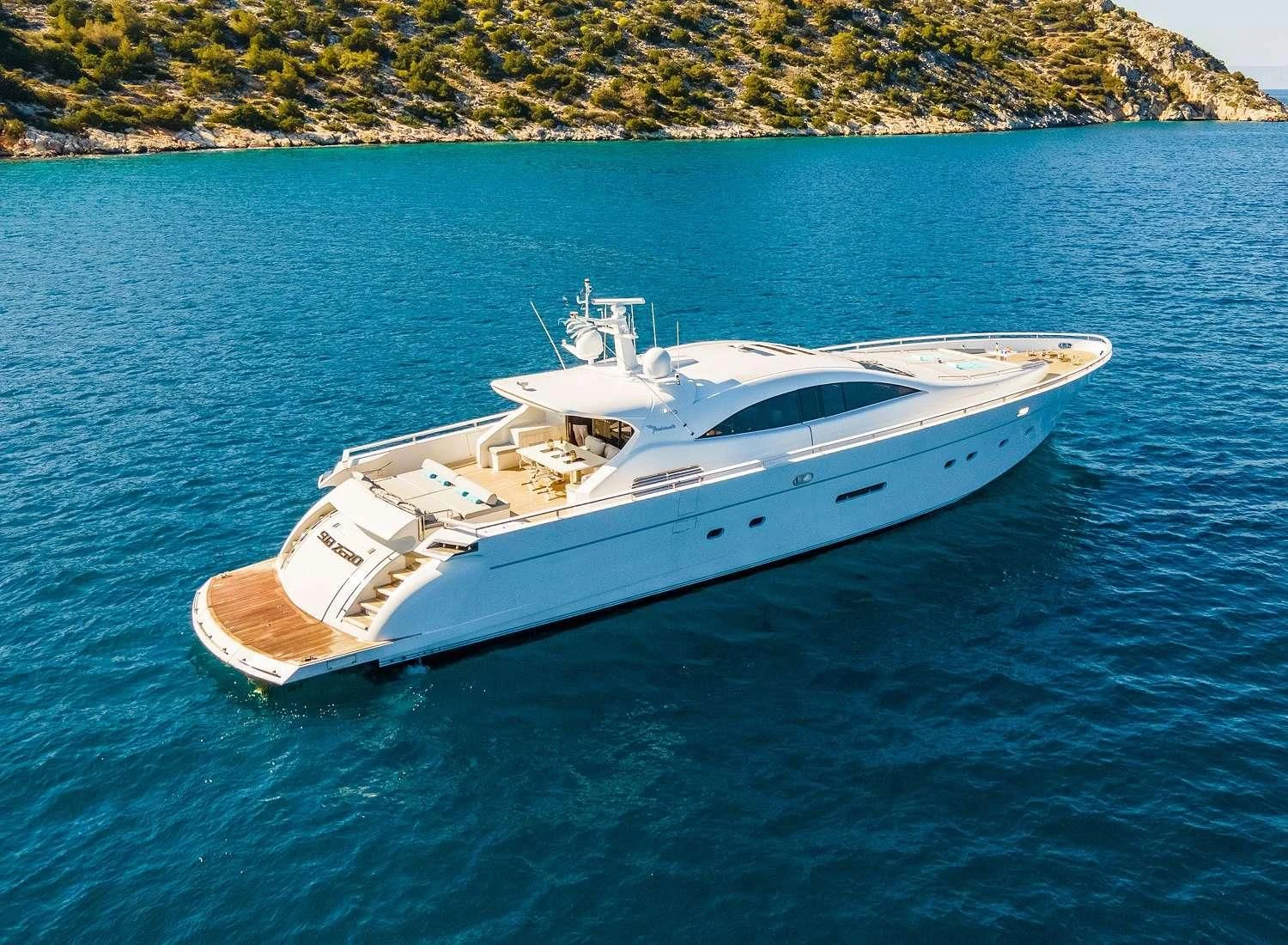 a white yacht in the water aboard MAC Yacht for Sale