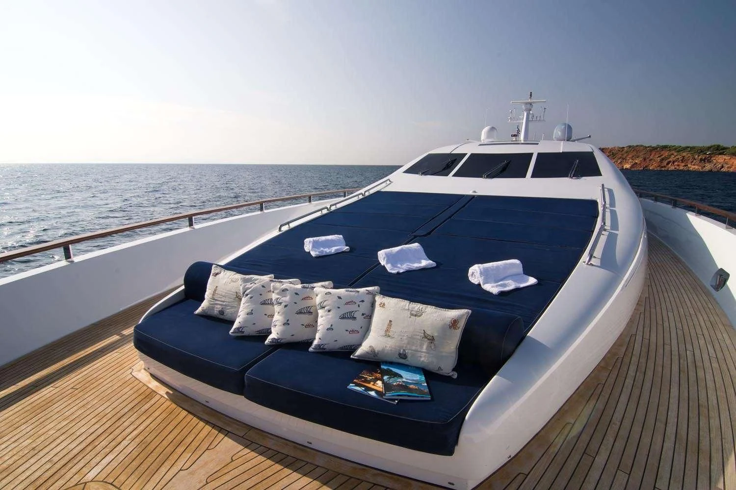 a boat on a deck aboard MAC Yacht for Sale
