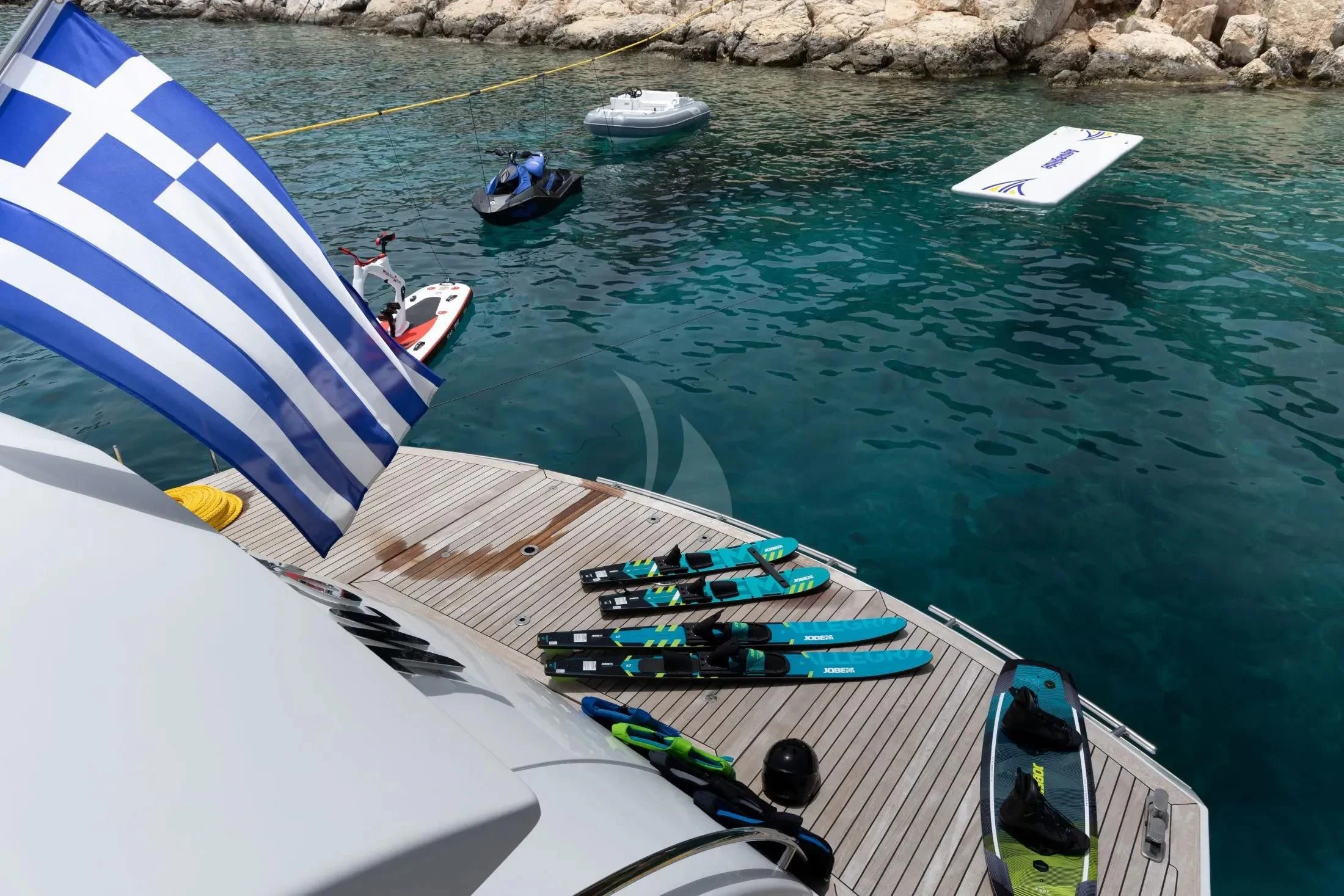 a group of boats on a body of water aboard MAC Yacht for Sale