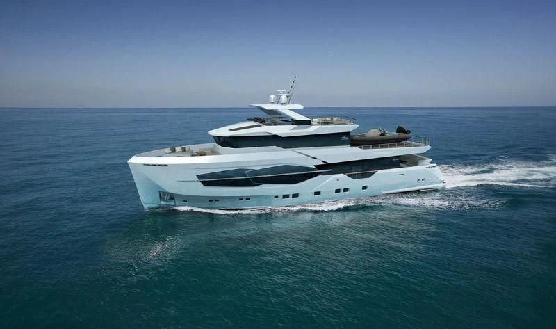 a white yacht in the ocean aboard Q.M Yacht for Sale