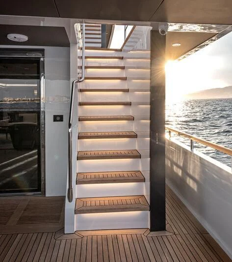a large metal staircase on a boat aboard ALAIA Yacht for Sale