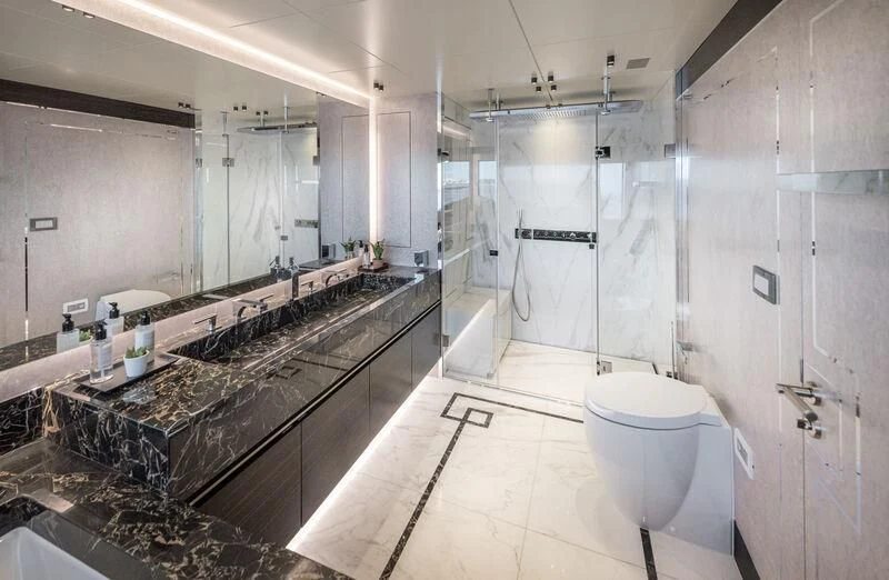 a bathroom with a large mirror aboard ALAIA Yacht for Sale