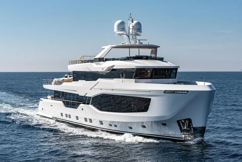 a white yacht on the water aboard ALAIA Yacht for Sale