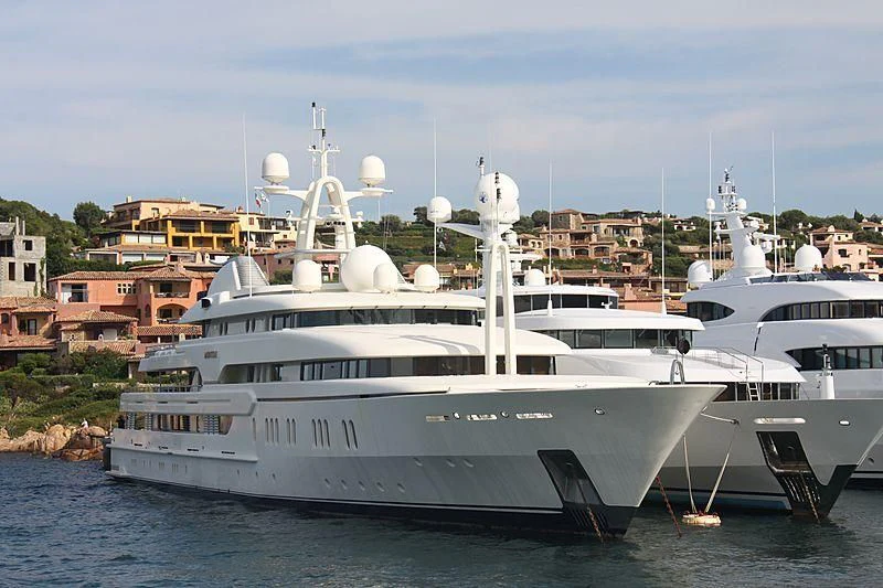 a couple of white yachts in the water aboard MONTKAJ Yacht for Sale