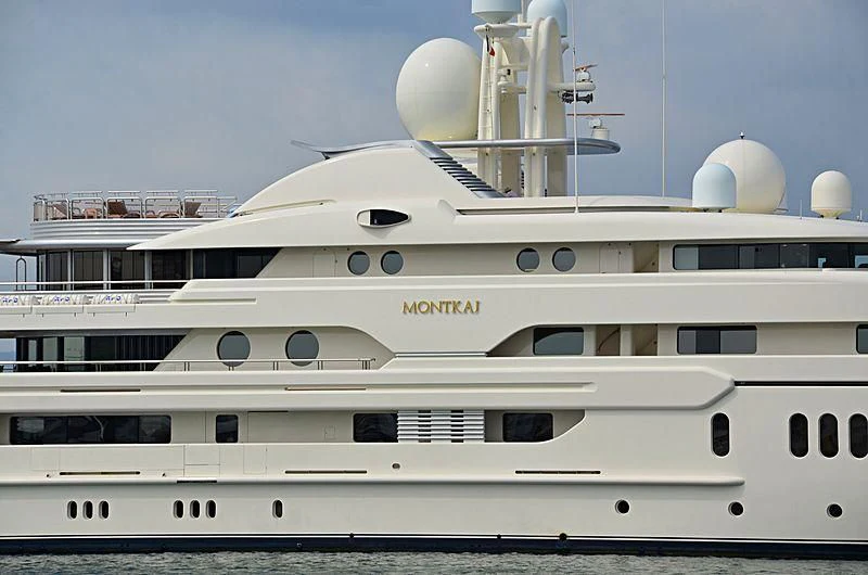 a white yacht with a white domed roof aboard MONTKAJ Yacht for Sale