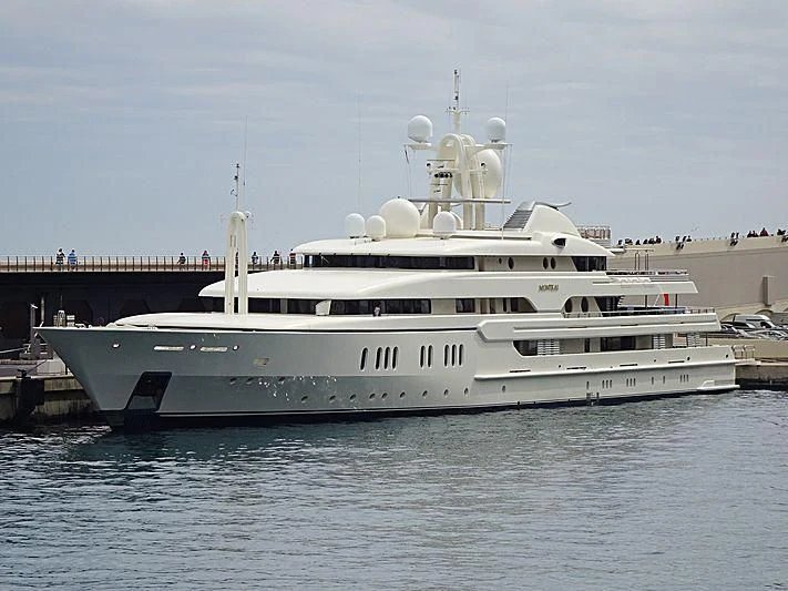 a large white boat aboard MONTKAJ Yacht for Sale