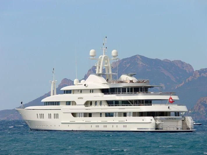 a large white boat in the water aboard MONTKAJ Yacht for Sale