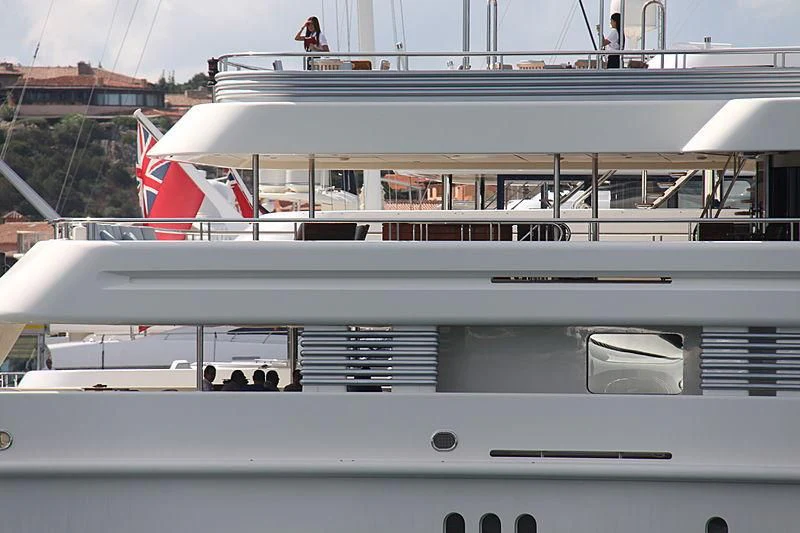 a boat with a flag on the front aboard MONTKAJ Yacht for Sale