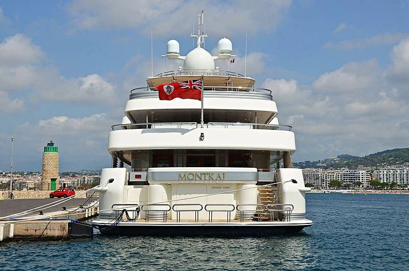 a large white boat in the water aboard MONTKAJ Yacht for Sale