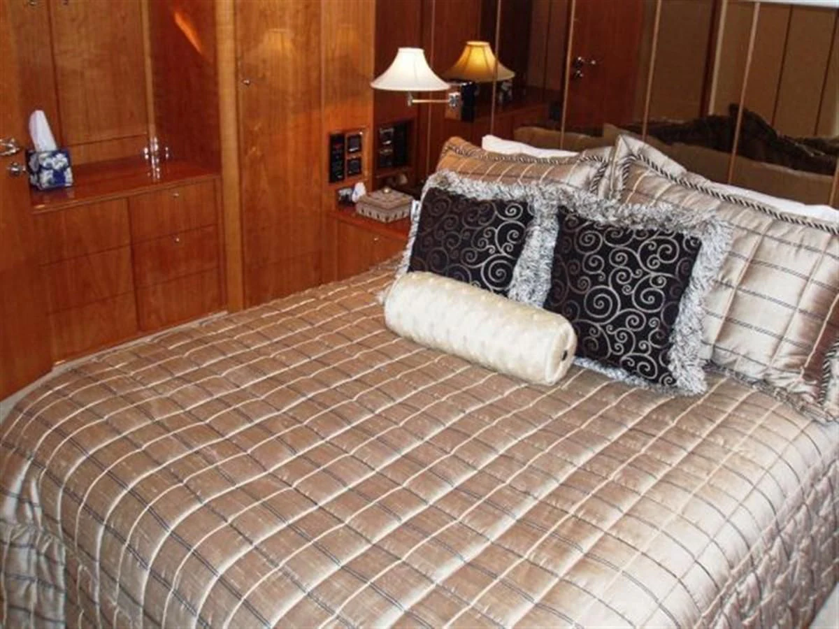 a bed with pillows aboard FOREVER SUMMER Yacht for Sale