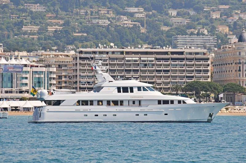 a white yacht in the water aboard CHANSON Yacht for Sale