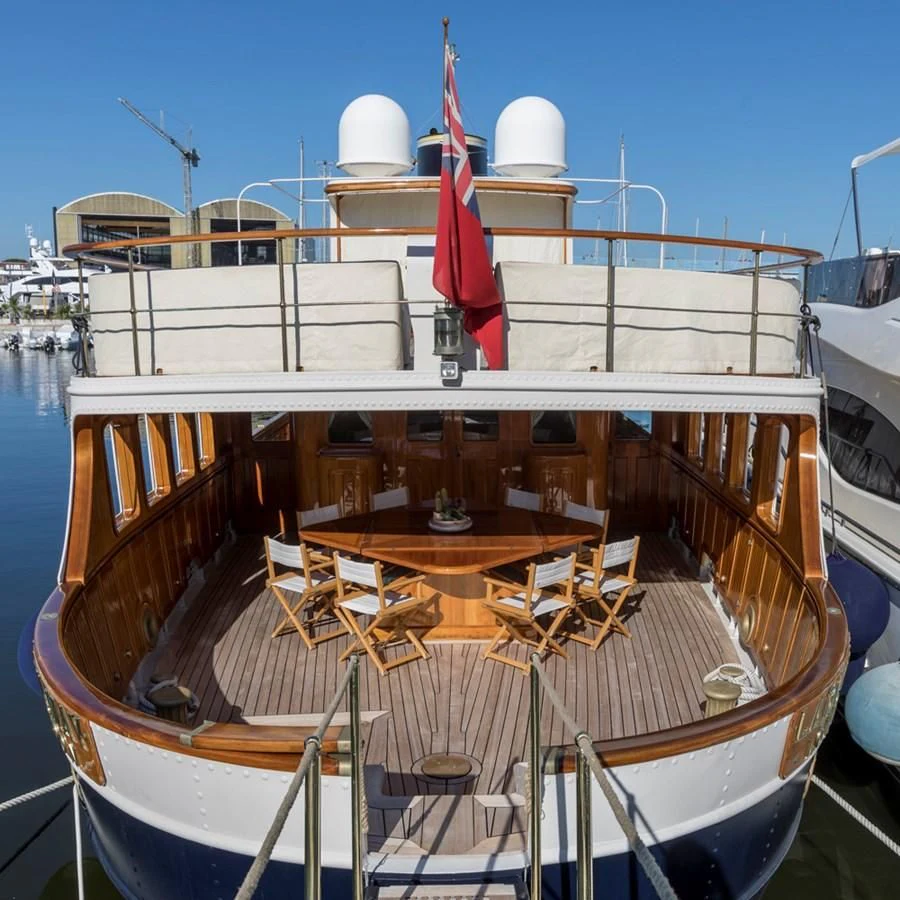 a boat docked at a pier aboard LADY MAY OF GLANDORE Yacht for Sale