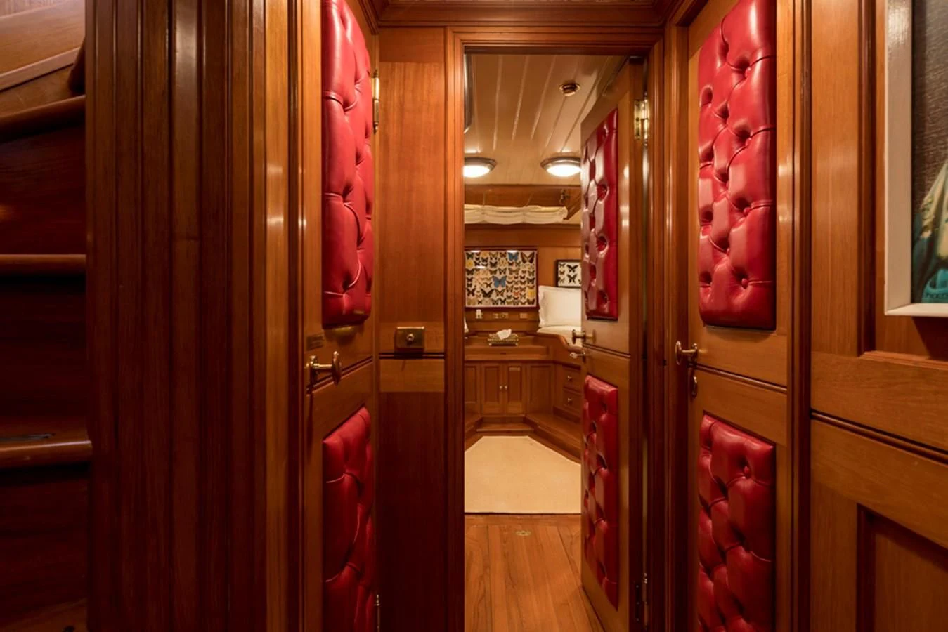 a store front with red doors aboard LADY MAY OF GLANDORE Yacht for Sale