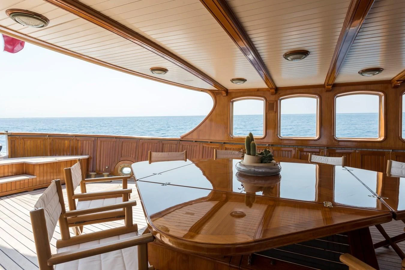a boat with a statue on the water aboard LADY MAY OF GLANDORE Yacht for Sale