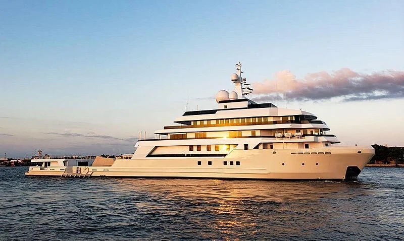 a large cruise ship in the water aboard VOYAGER Yacht for Sale
