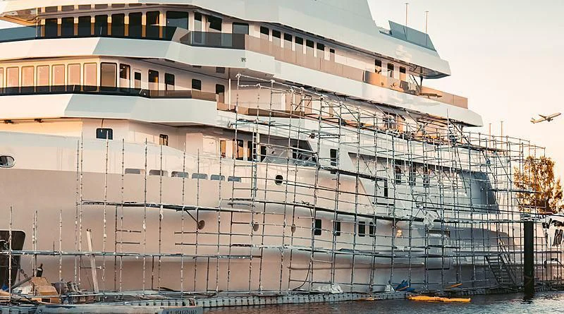 a large white building with a large glass front aboard VOYAGER Yacht for Sale