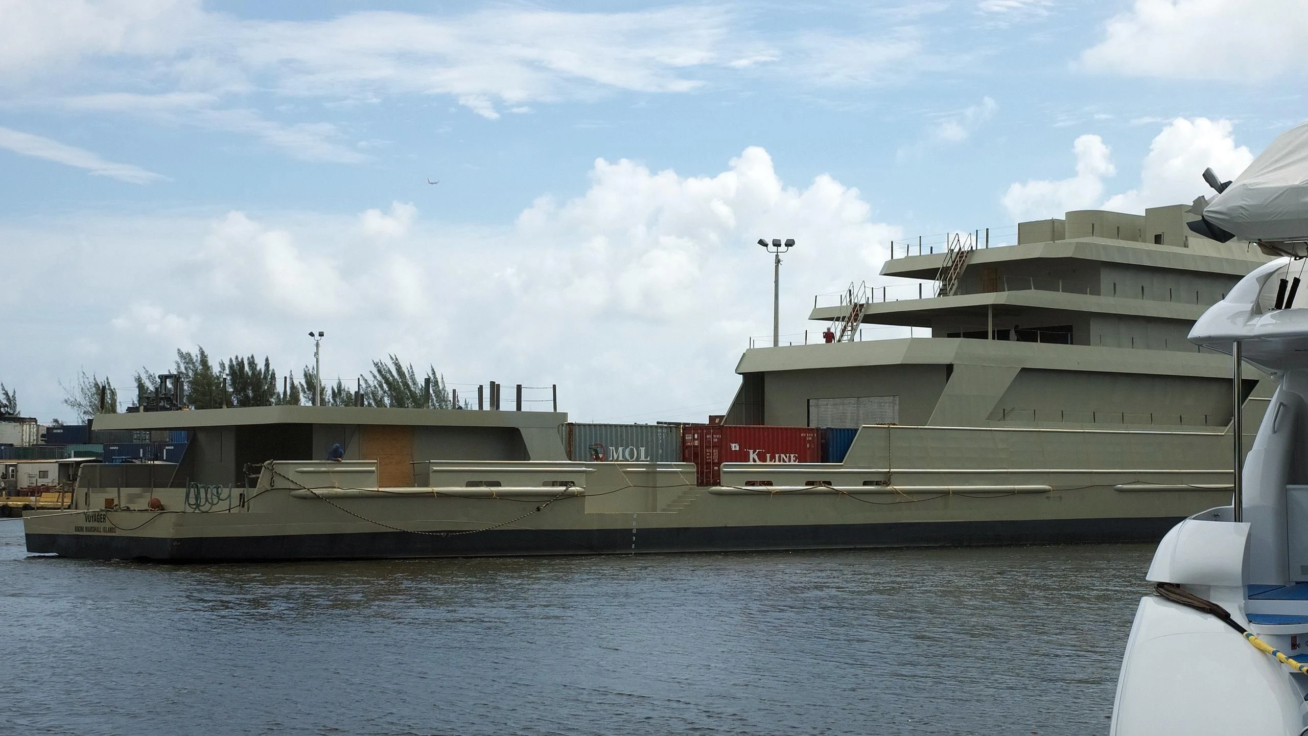 a large ship docked aboard VOYAGER Yacht for Sale