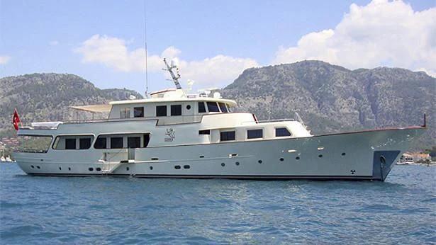 a white boat in the water aboard CHINI VI Yacht for Sale