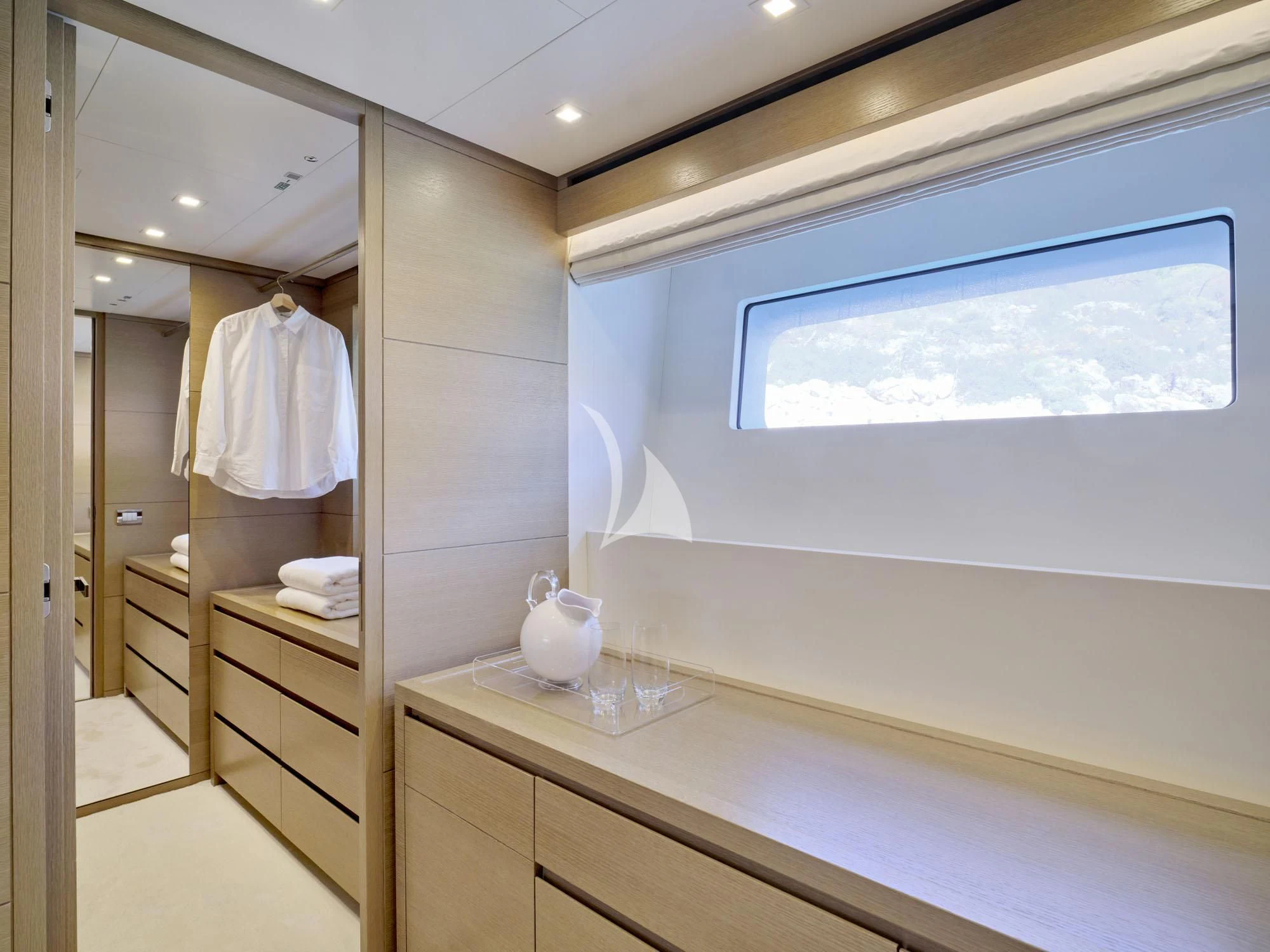 a bathroom with a large mirror aboard FLOR Yacht for Charter
