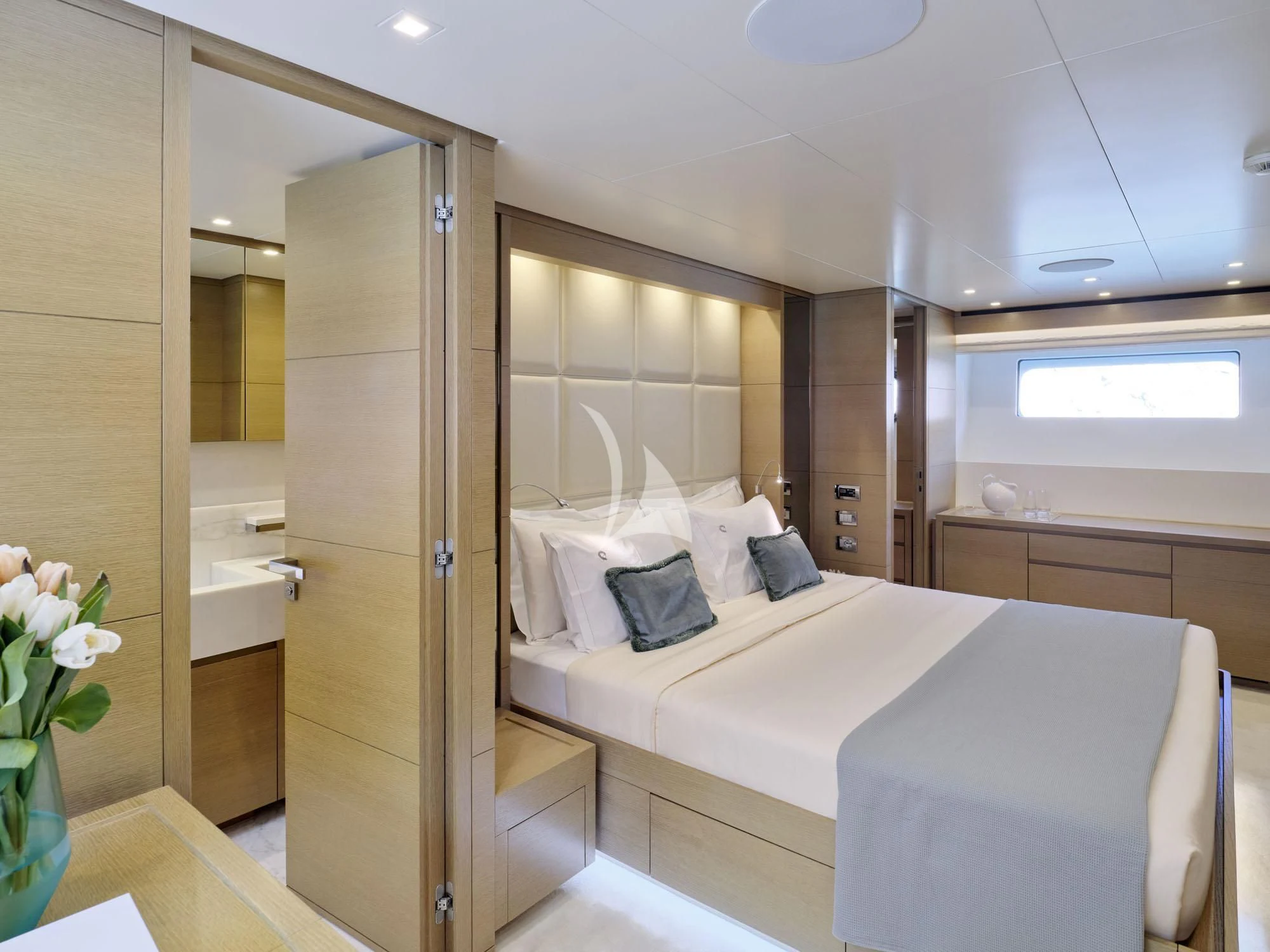 a bathroom with a glass shower aboard FLOR Yacht for Charter