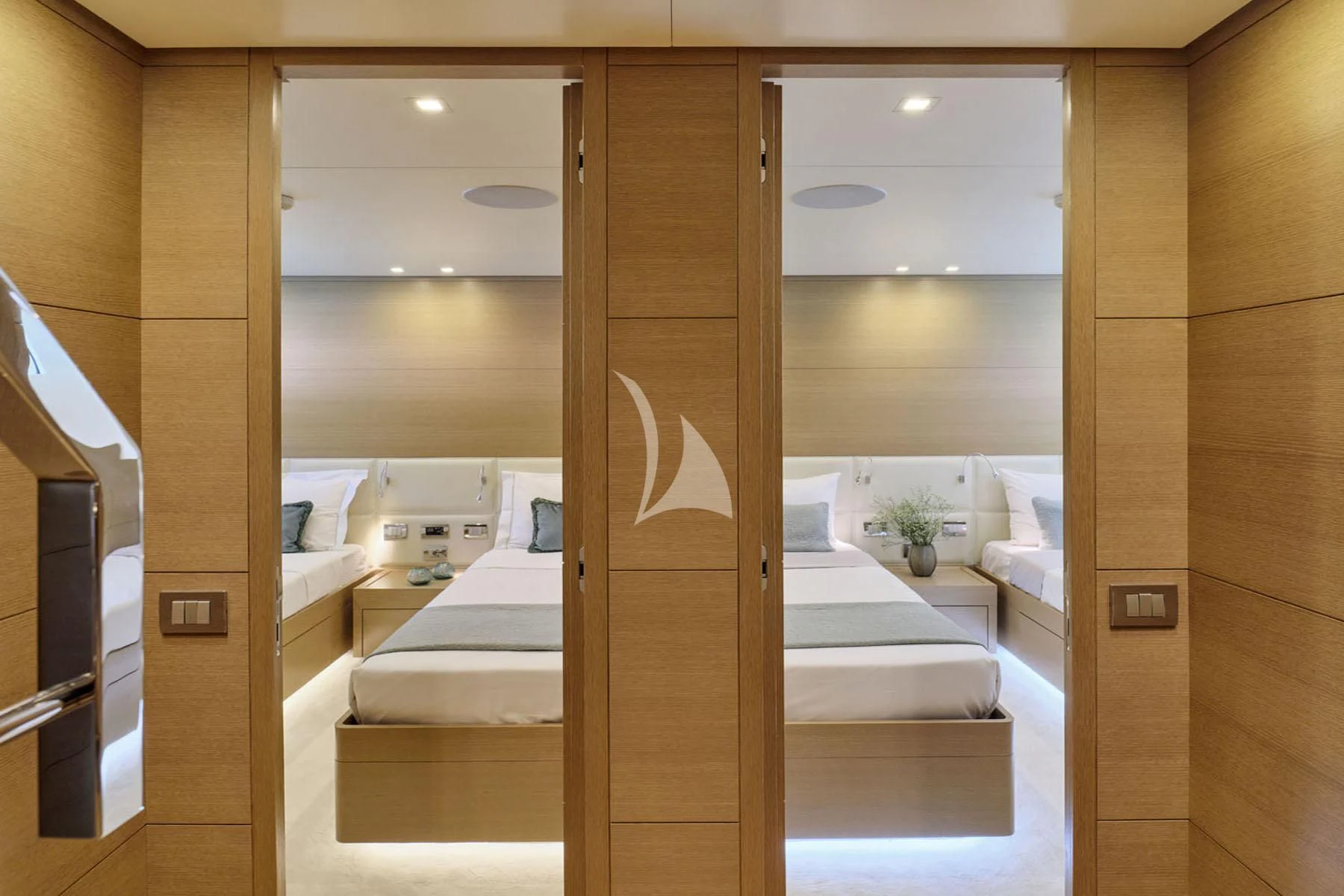 a room with a wood door aboard FLOR Yacht for Charter