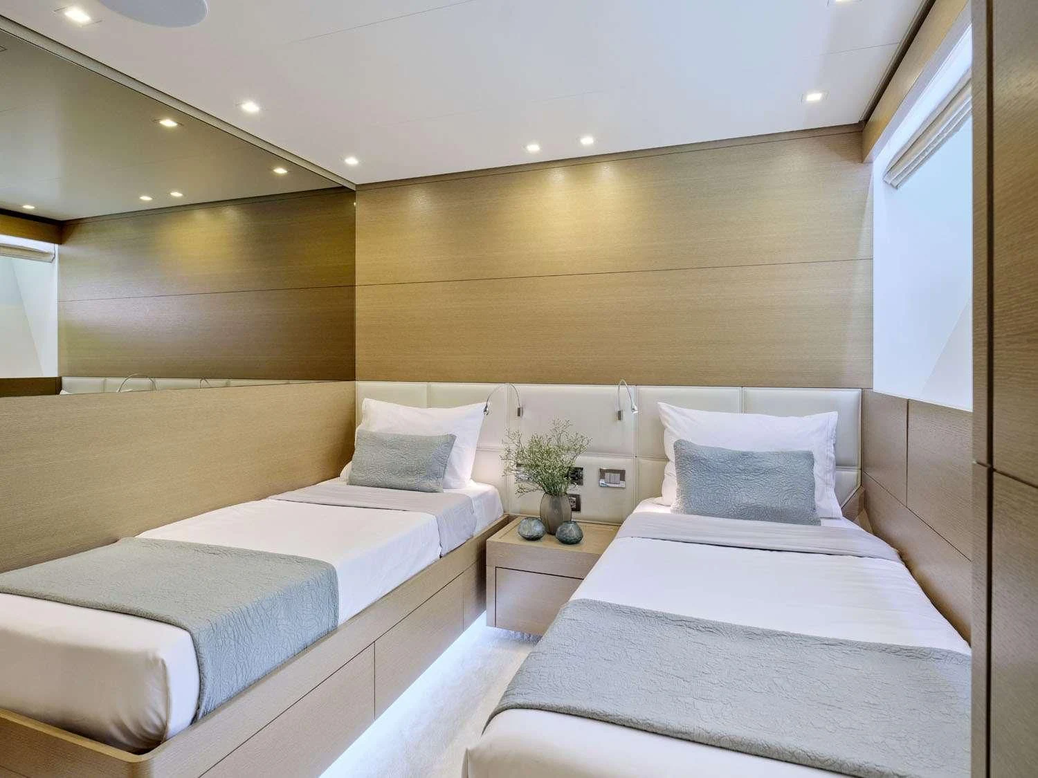 a room with two beds aboard FLOR Yacht for Charter
