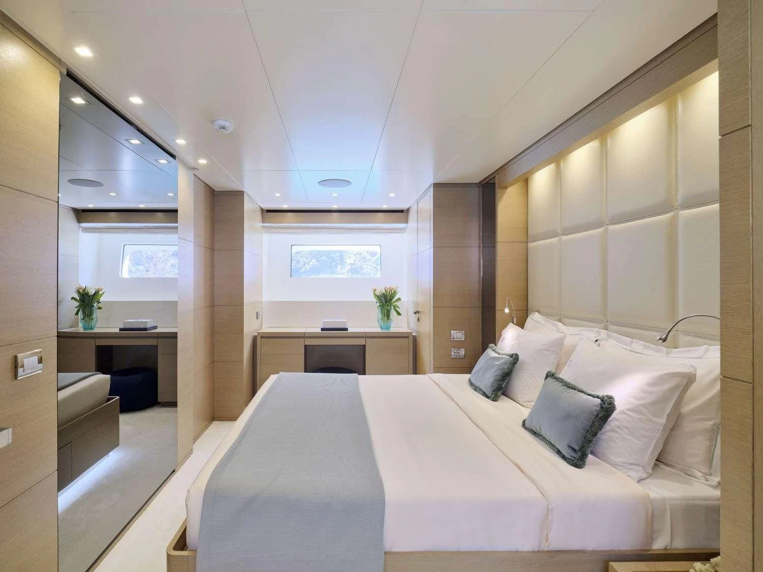 a bed in a room aboard FLOR Yacht for Charter