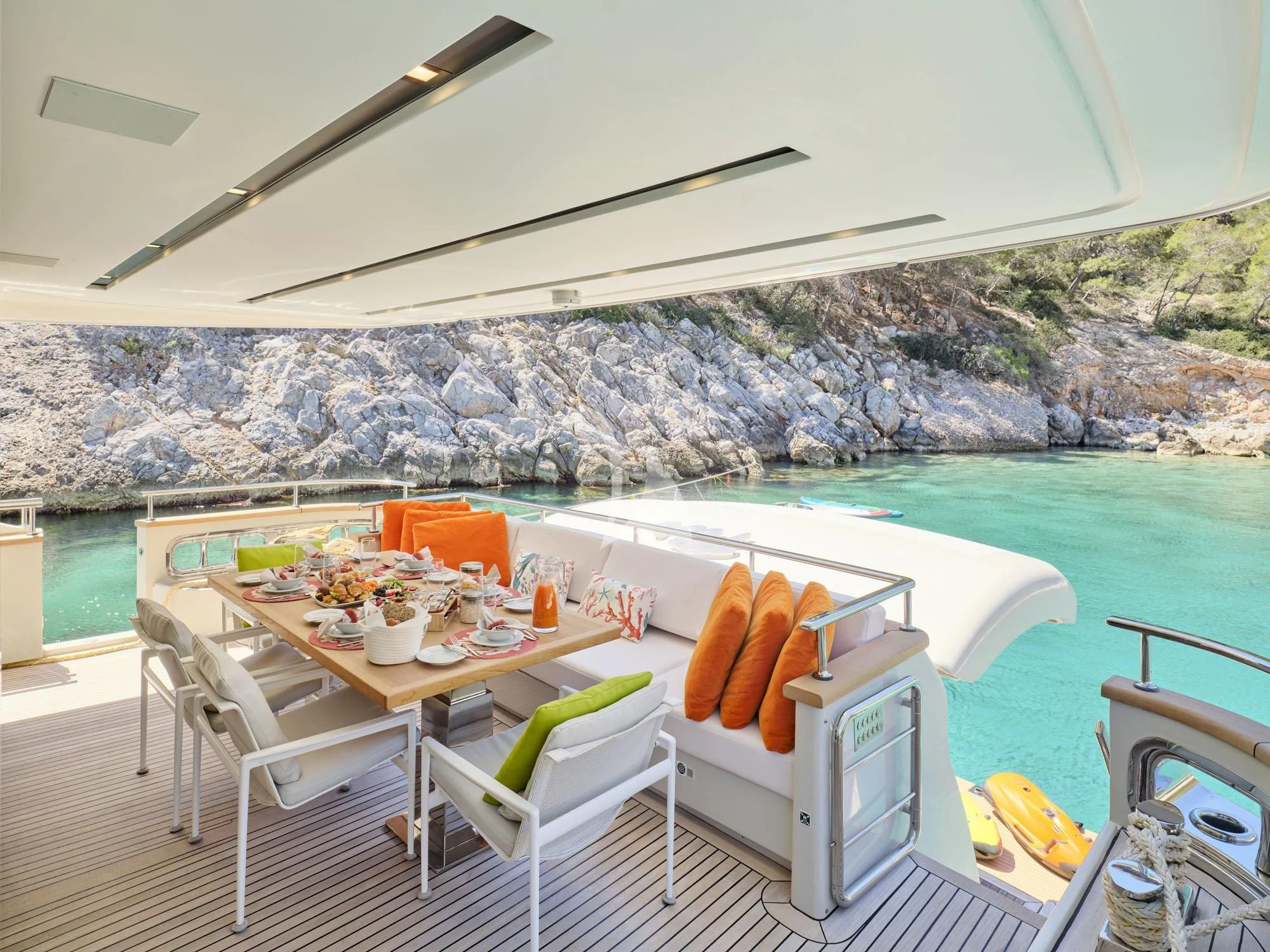 a table with food on it aboard FLOR Yacht for Charter