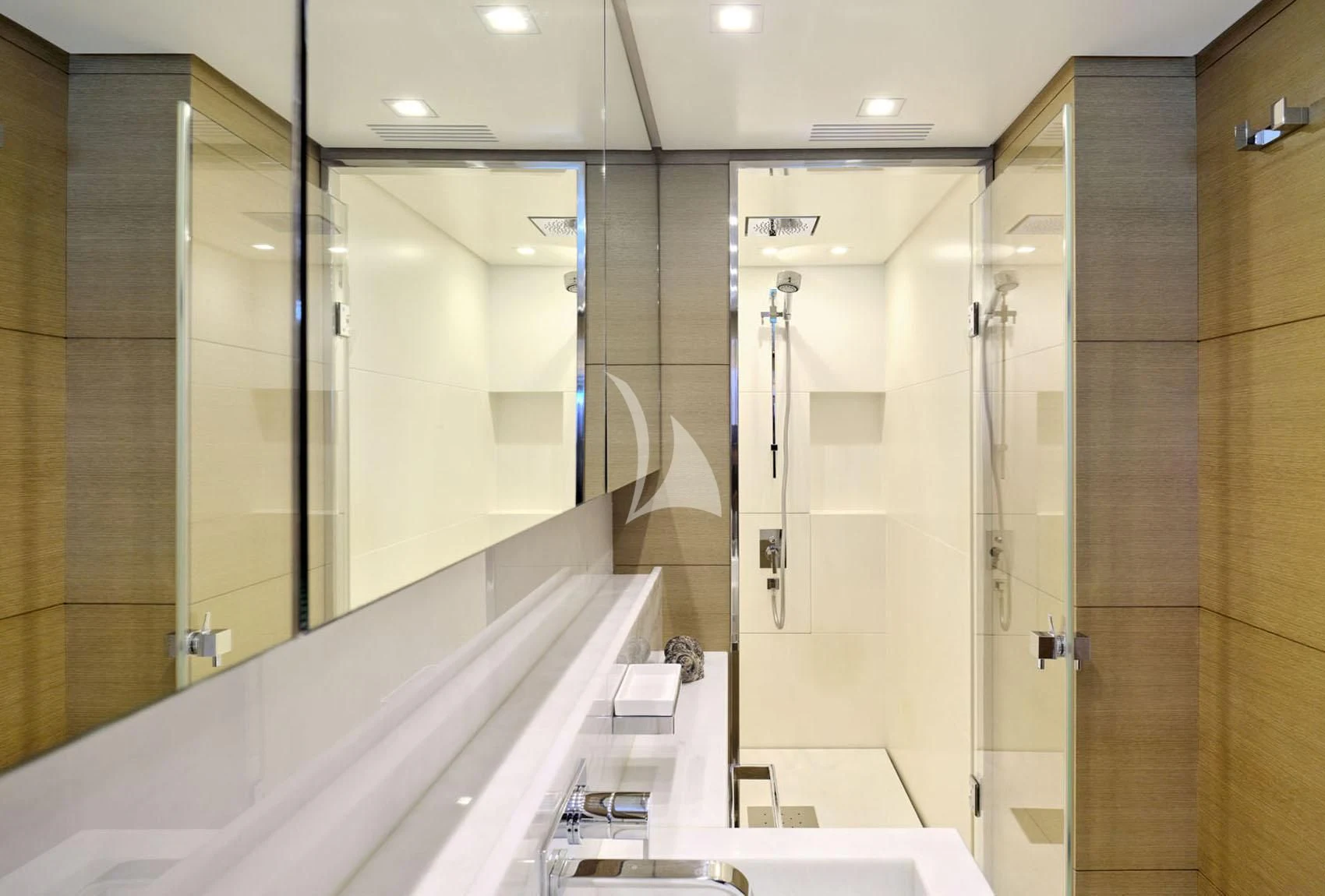 a bathroom with a large mirror aboard FLOR Yacht for Charter