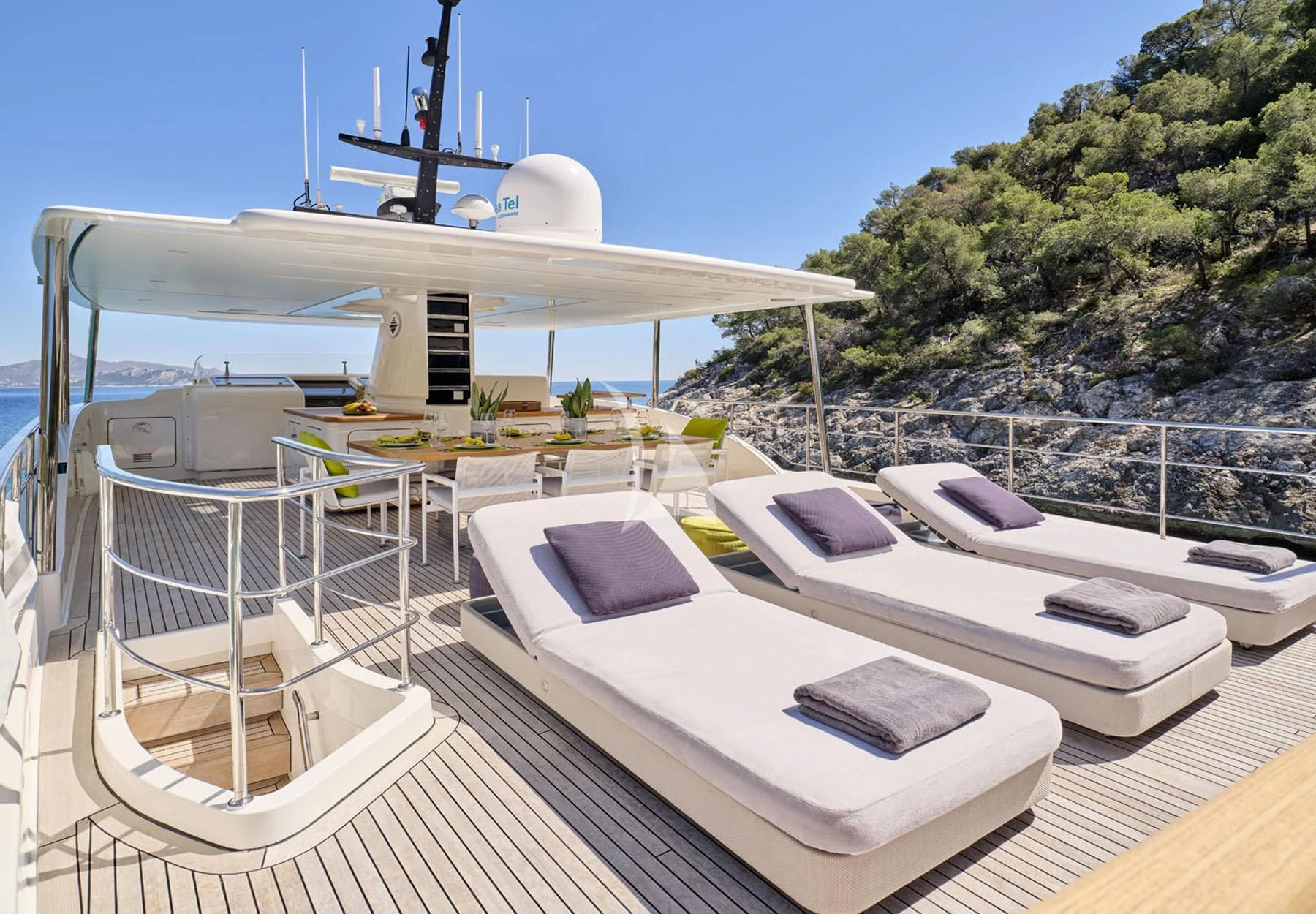 a large white pool with a large white building and a large white dome on top of it aboard FLOR Yacht for Charter
