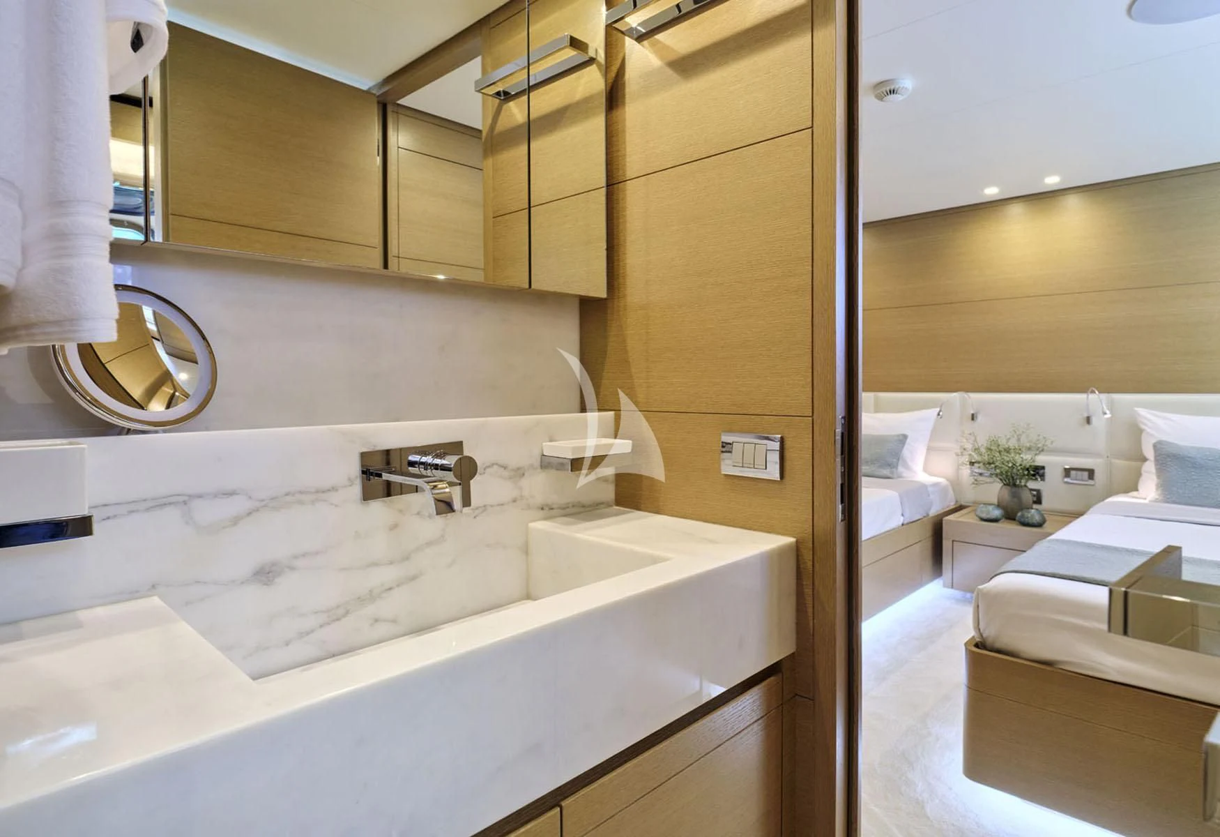 a bathroom with a sink and a mirror aboard FLOR Yacht for Charter