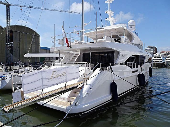 a boat docked in a harbor aboard MY BAYA Yacht for Sale
