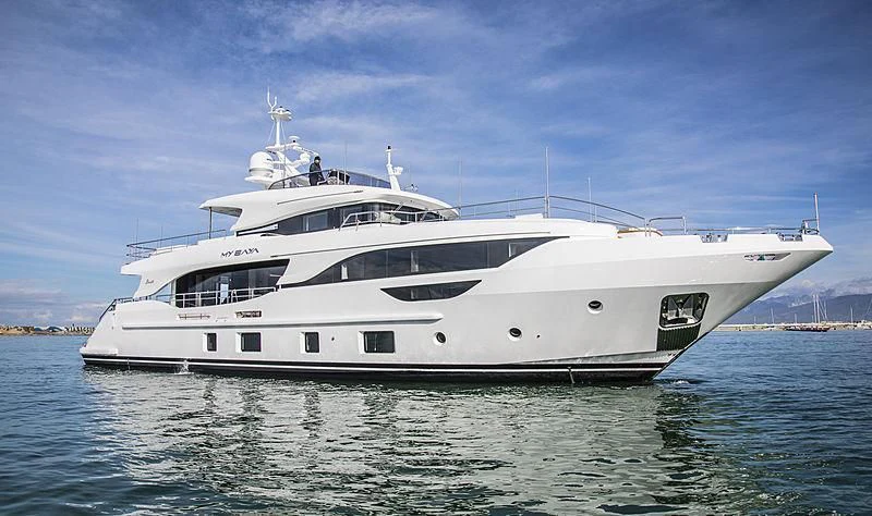 a white yacht in the water aboard MY BAYA Yacht for Sale