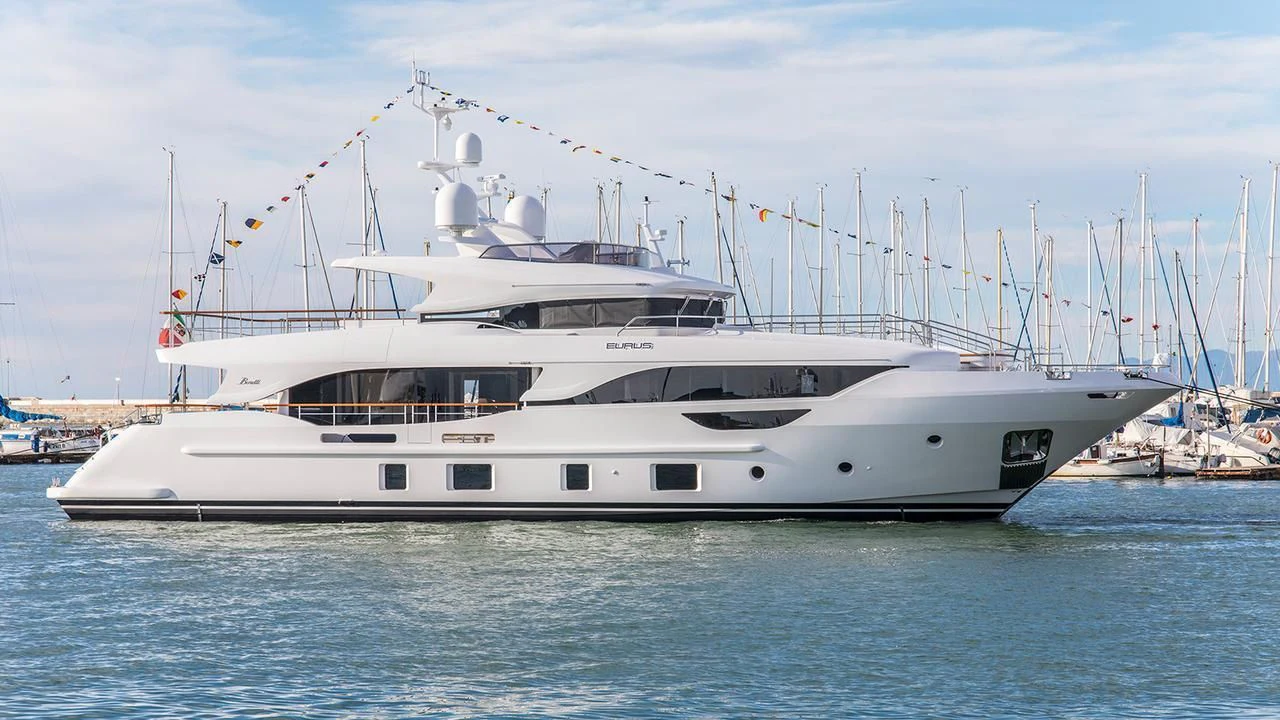 a white yacht in the water aboard MY BAYA Yacht for Sale
