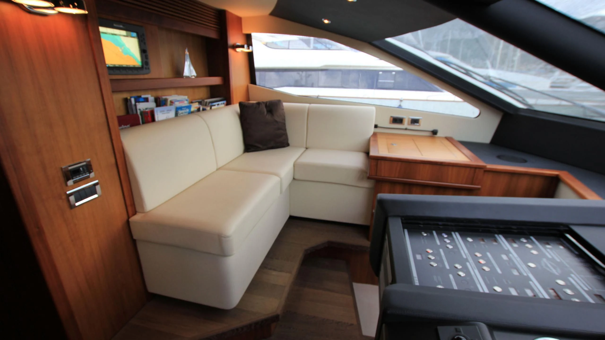 a room with a couch and a television aboard ABRAHAM M Yacht for Sale