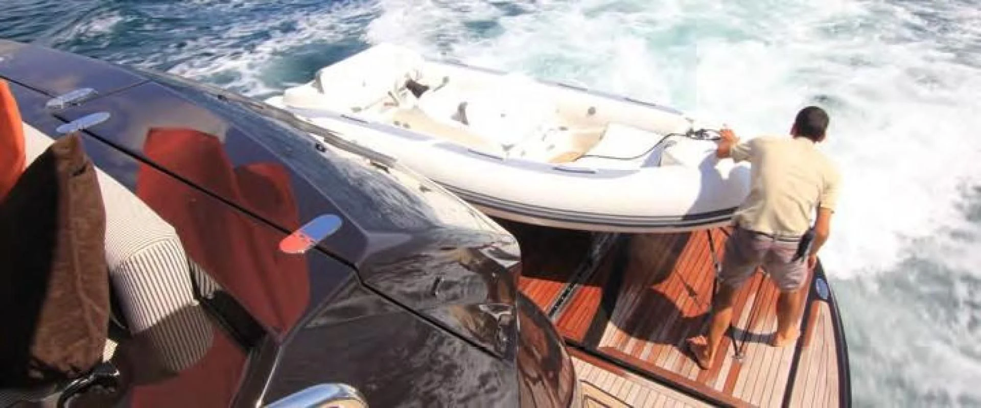 a couple of men on a boat aboard ABRAHAM M Yacht for Sale