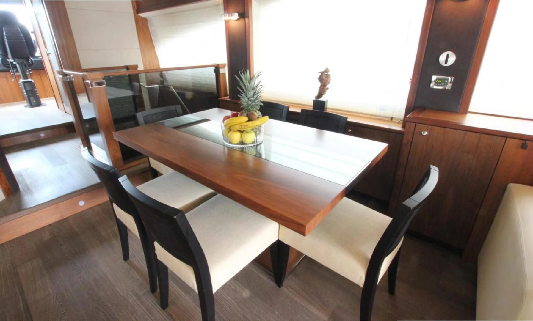 a table with chairs around it aboard ABRAHAM M Yacht for Sale