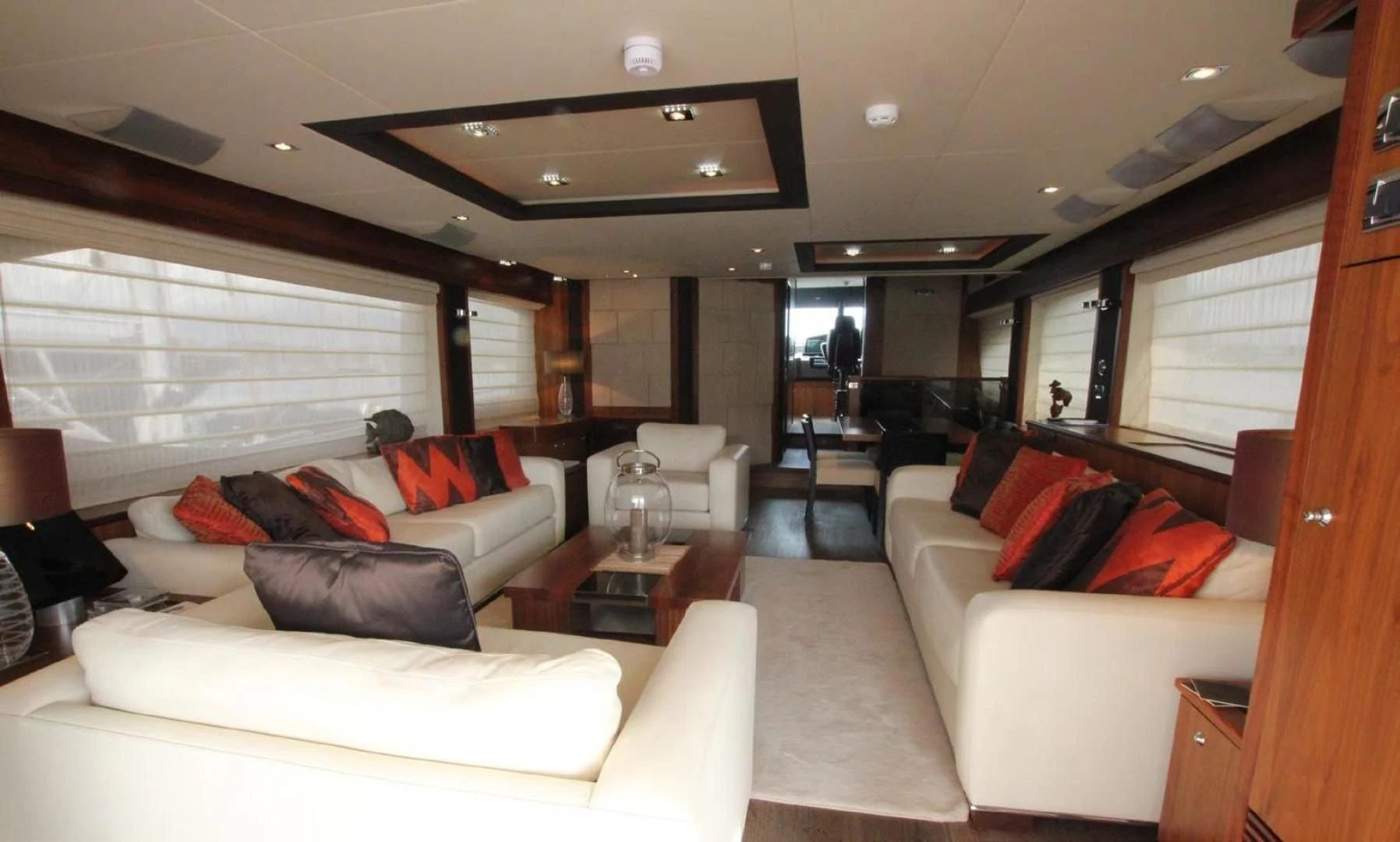 a living room with a couch and a coffee table aboard ABRAHAM M Yacht for Sale