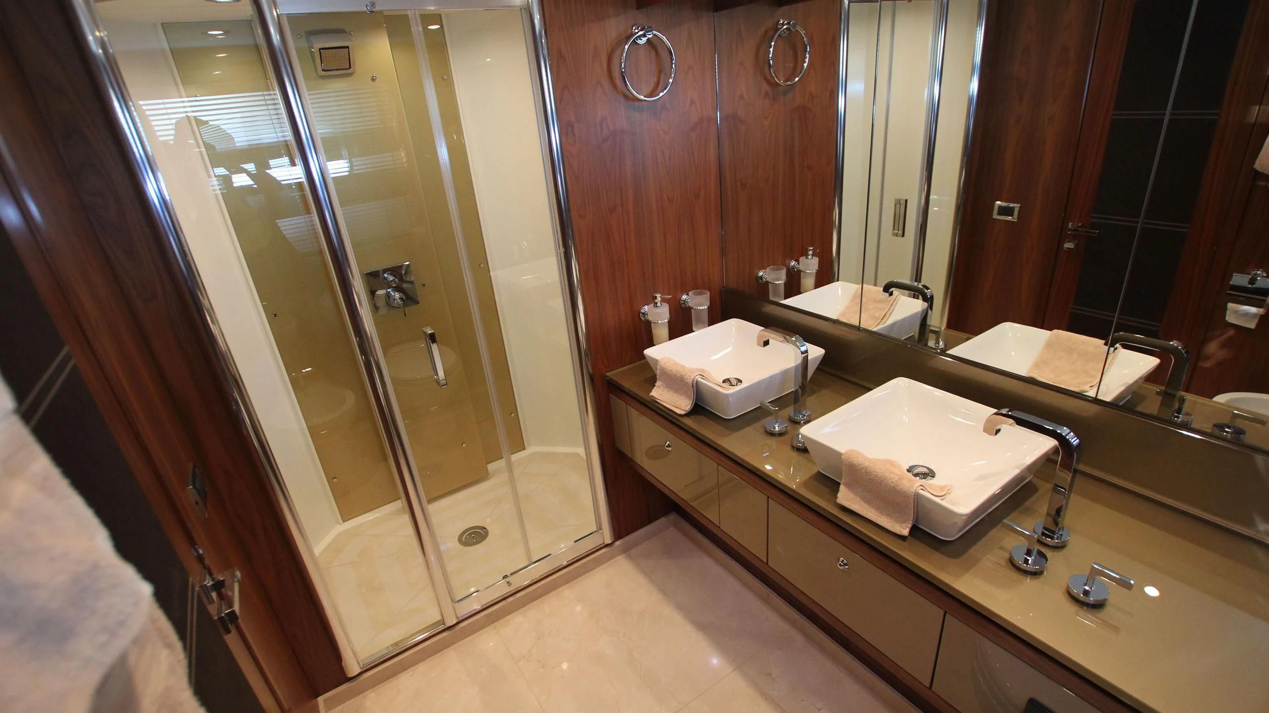 a bathroom with a large mirror aboard ABRAHAM M Yacht for Sale